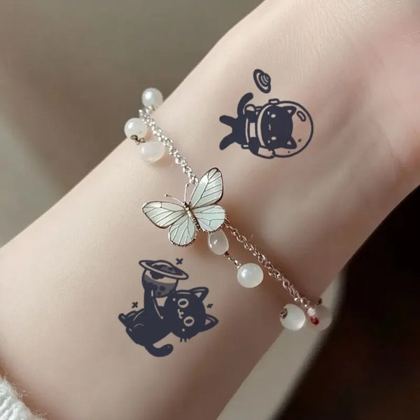 2pcs Space Little Black Temporary Body Tattoo Stickers